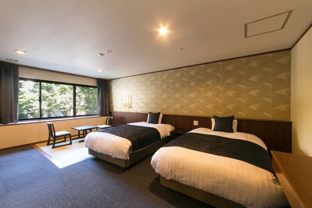 Suimeikan Gero Exterior foto A room at the hotel